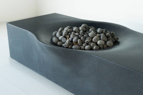 A picture of the Nido Fire Table in the color Pacific Midnight by Montana Fire Pits