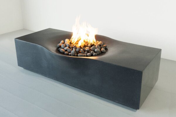A picture of the Nido Fire Table in the color Pacific Midnight by Montana Fire Pits
