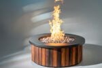 luxury fire pit with metal top and hardwood sides
