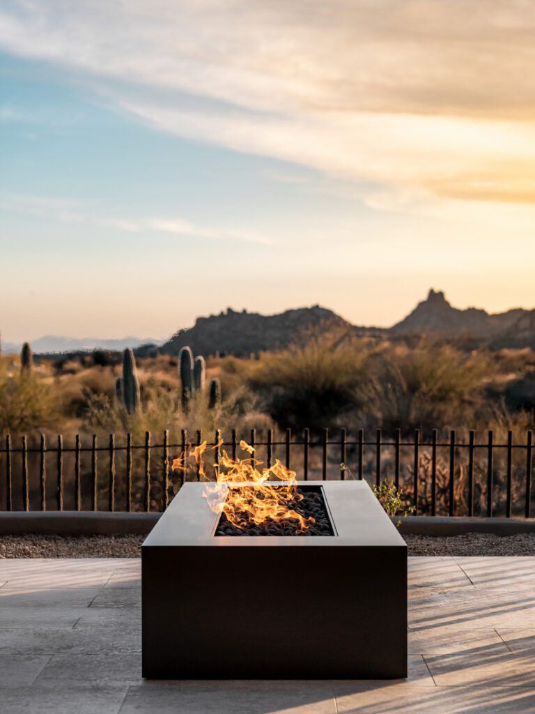 76 River Stone Olympic from Montana Fire Pits with mountains in the distance