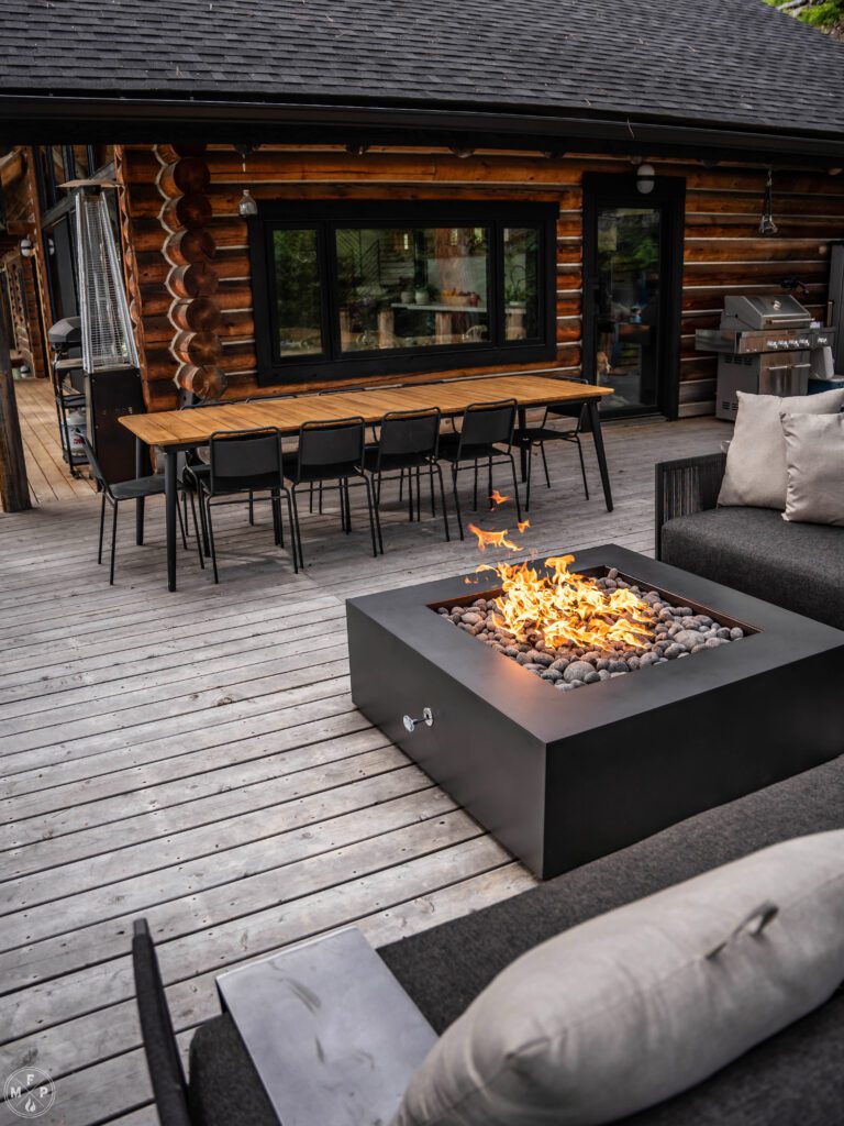 Dietrick Forged Charcoal Glacier from Montana Fire Pits on a patio in the forest